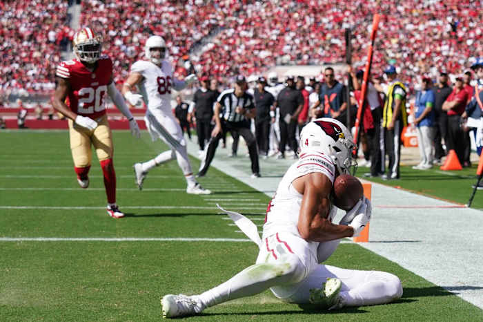 Arizona Cardinals wide receiver Michael Wilson (14) catches a touchdown against the San Francisco 49ers in the second quarter at Levi's Stadium.